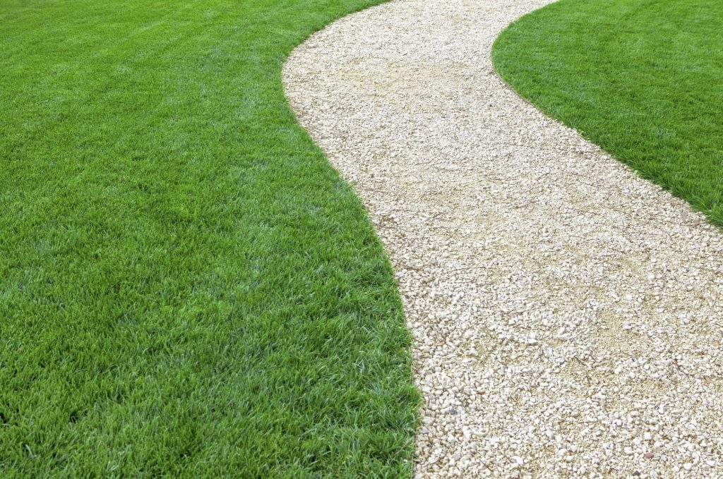 Curved garden path made of gravel